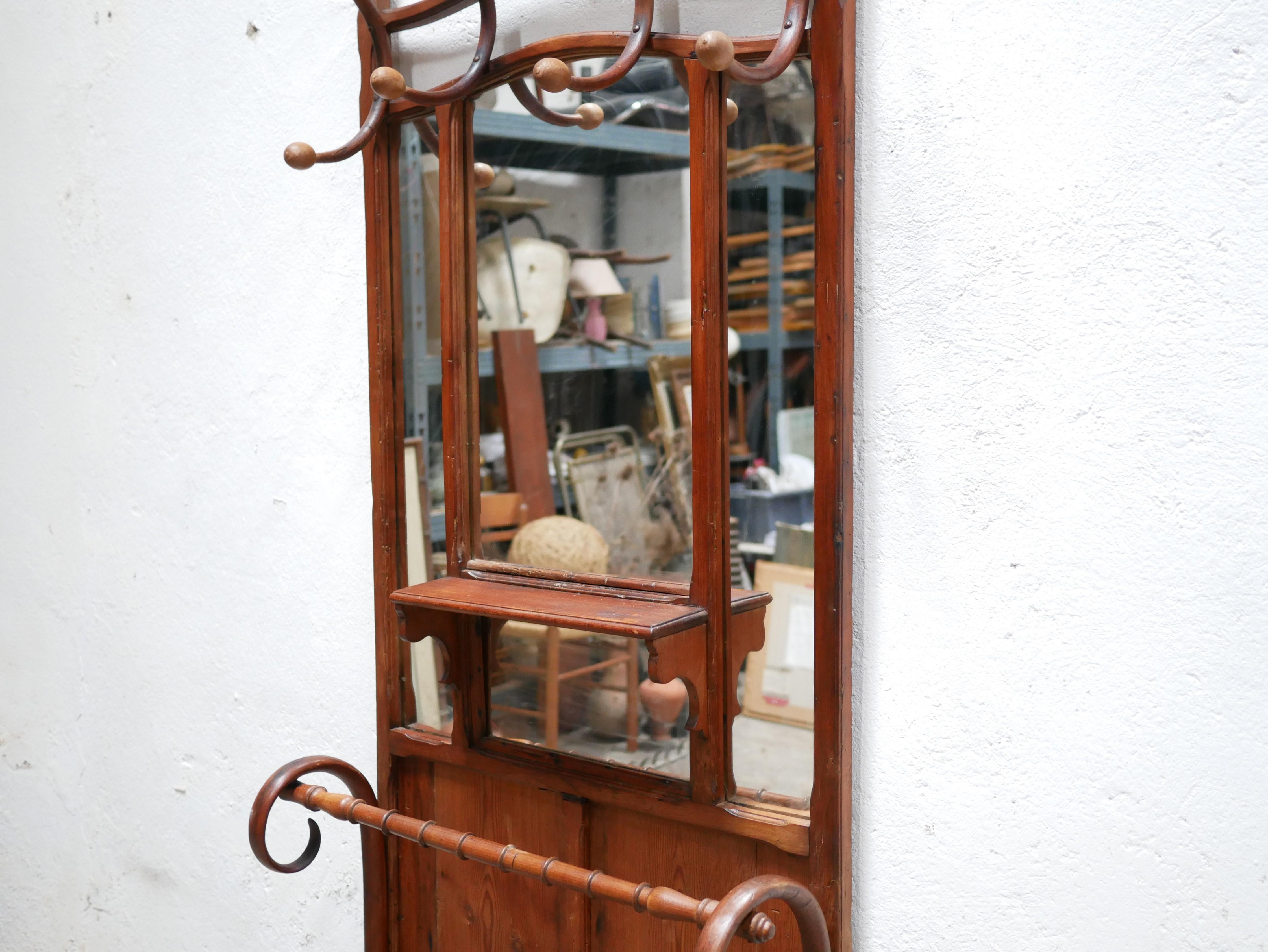 Old wooden locker room coat rack 1