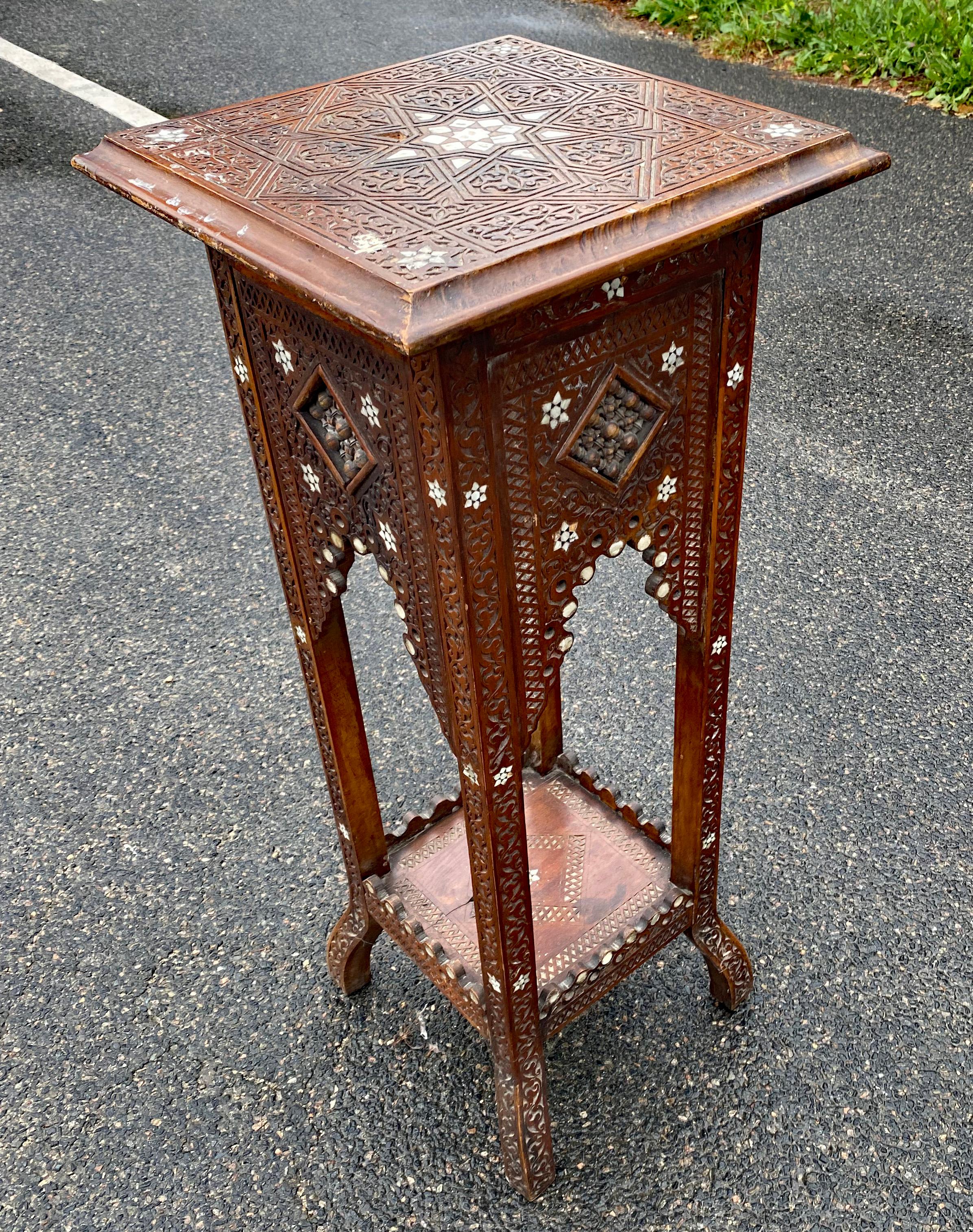 Maghreb Old wooden pedestal with bone and mother-of-pearl incrustation, oriental work  For Sale