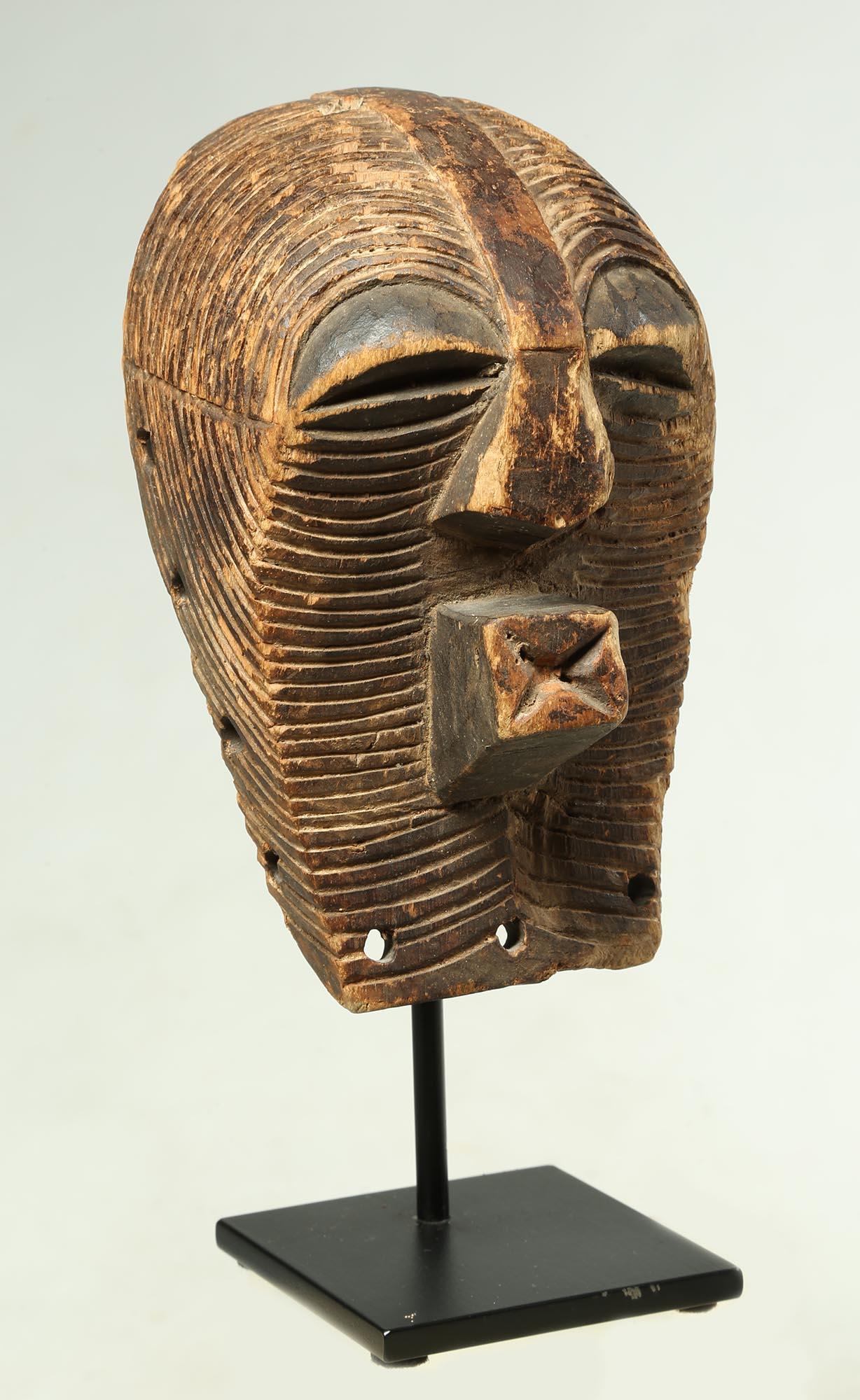Hand-Carved Old Worn Small Songye Kifwebe Mask with Fine Striations Around Face Cubist Mouth