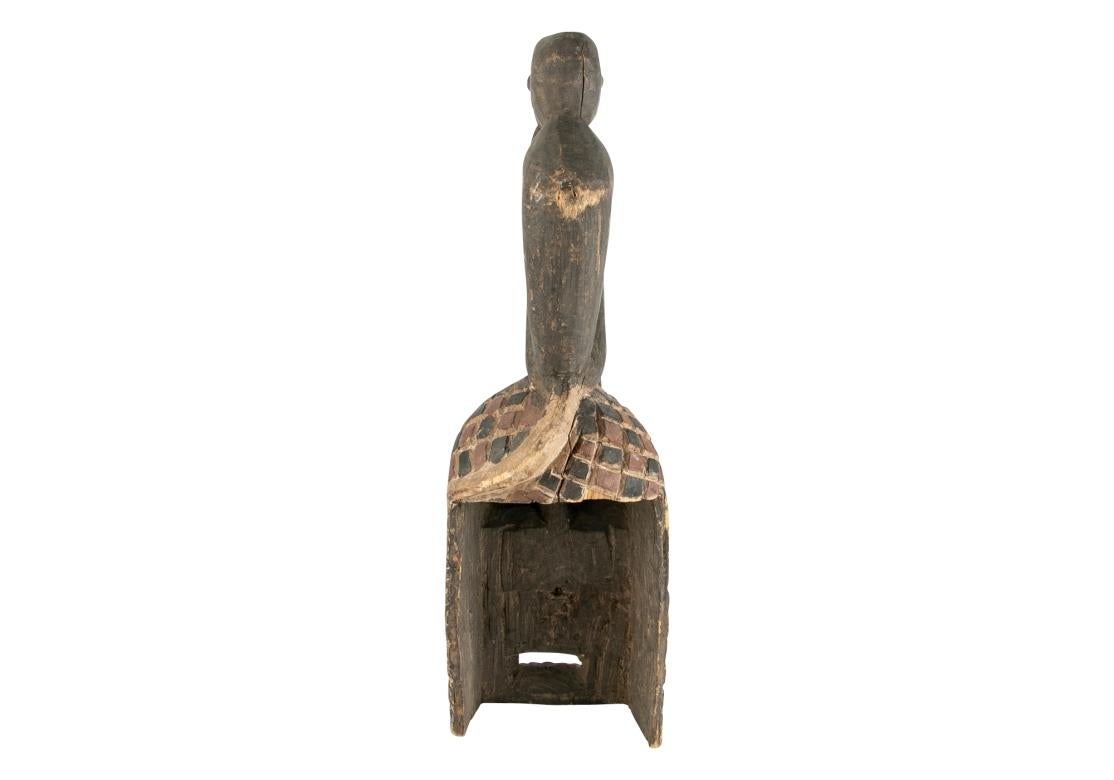 Older African Dance Mask Surmounted With A Sitting Figure (Stammeskunst) im Angebot