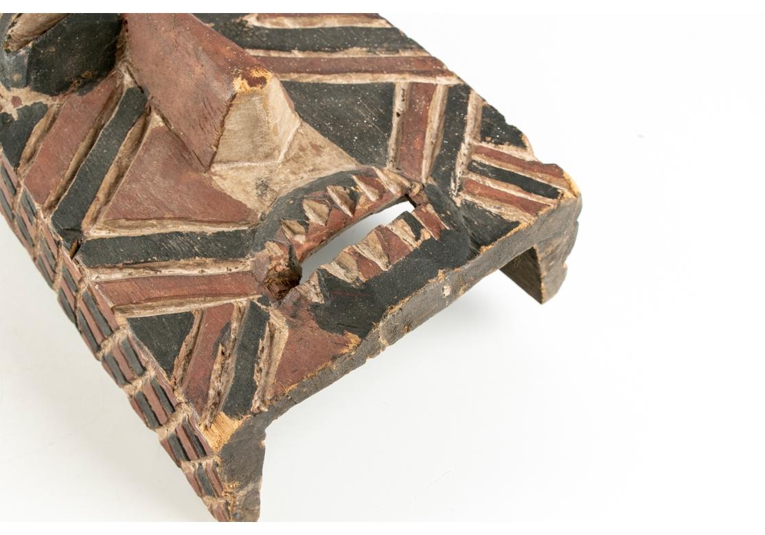 Older African Dance Mask Surmounted With A Sitting Figure (Handgeschnitzt) im Angebot