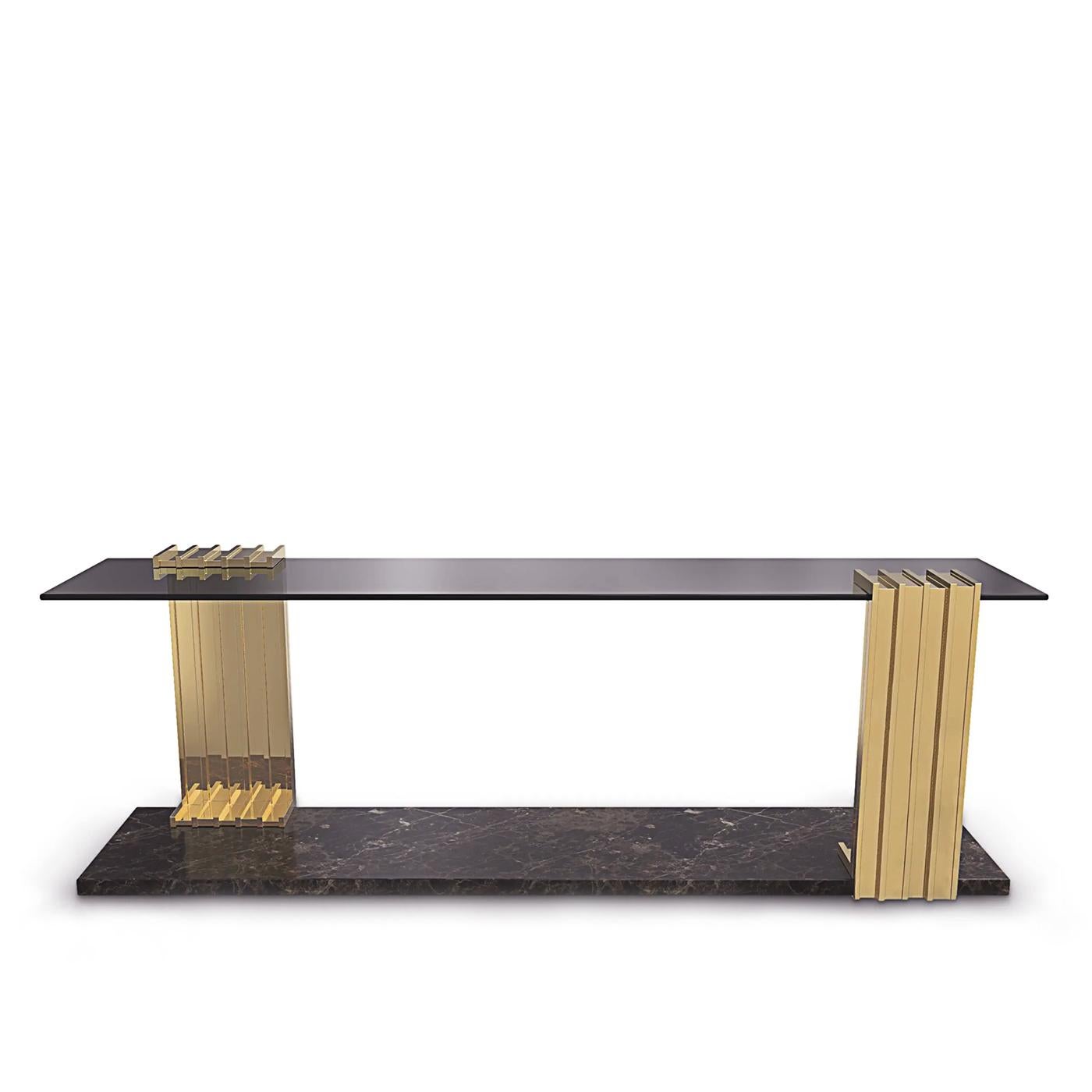Console table oldies low with solid polished brass feet,
with black marble base and with smocked glass top.