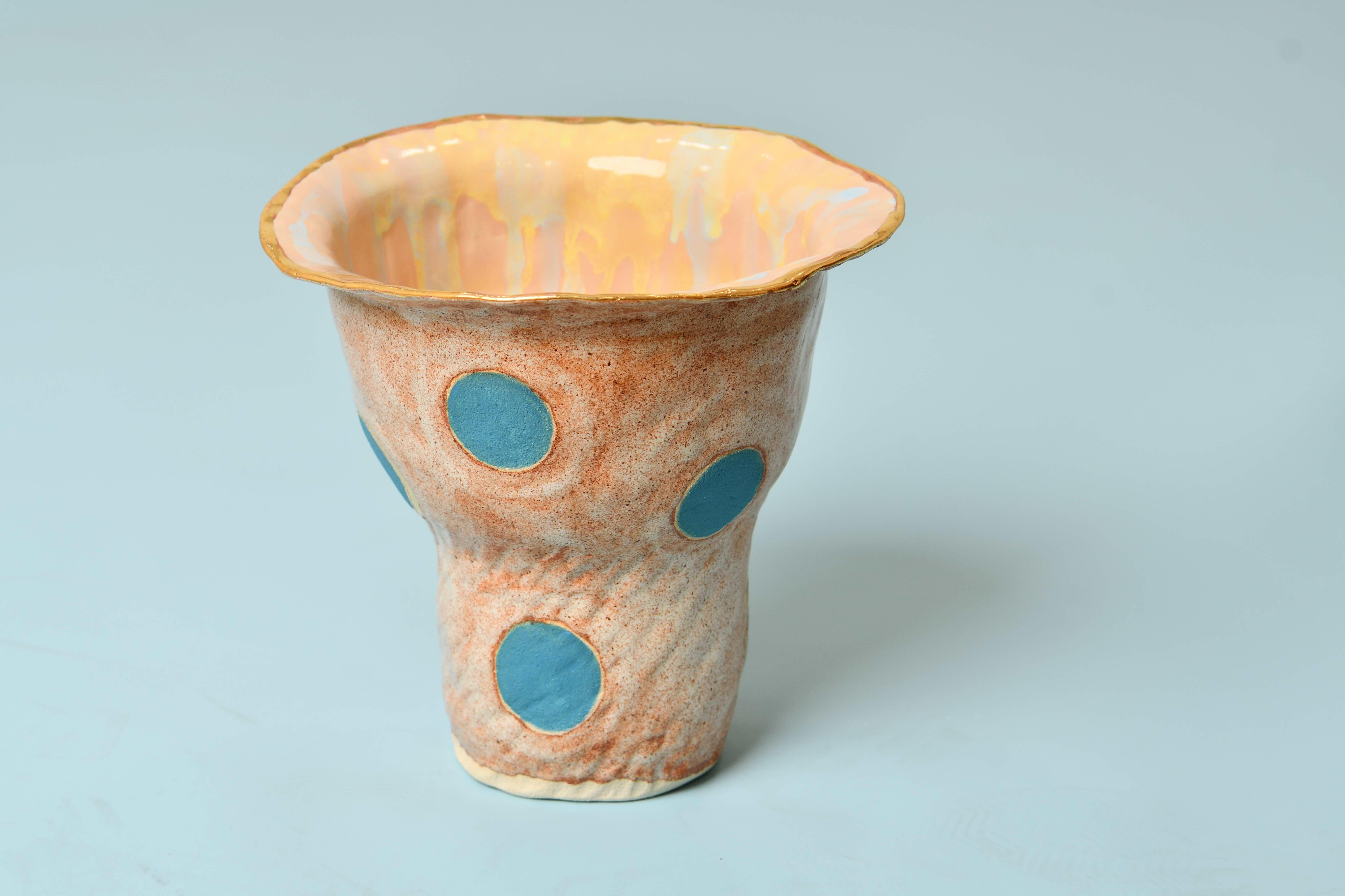 Olé 2 Vase by Hania Jneid
Unique Piece.
Dimensions: Ø 17 x H 23 cm
Materials: Stoneware, glaze and gold luster.

Numbered Olé Vase in the collection Olé, a tribute to the Flamenco culture. Color: Beige, blue Dots, Gold enamel. Built and glazed by