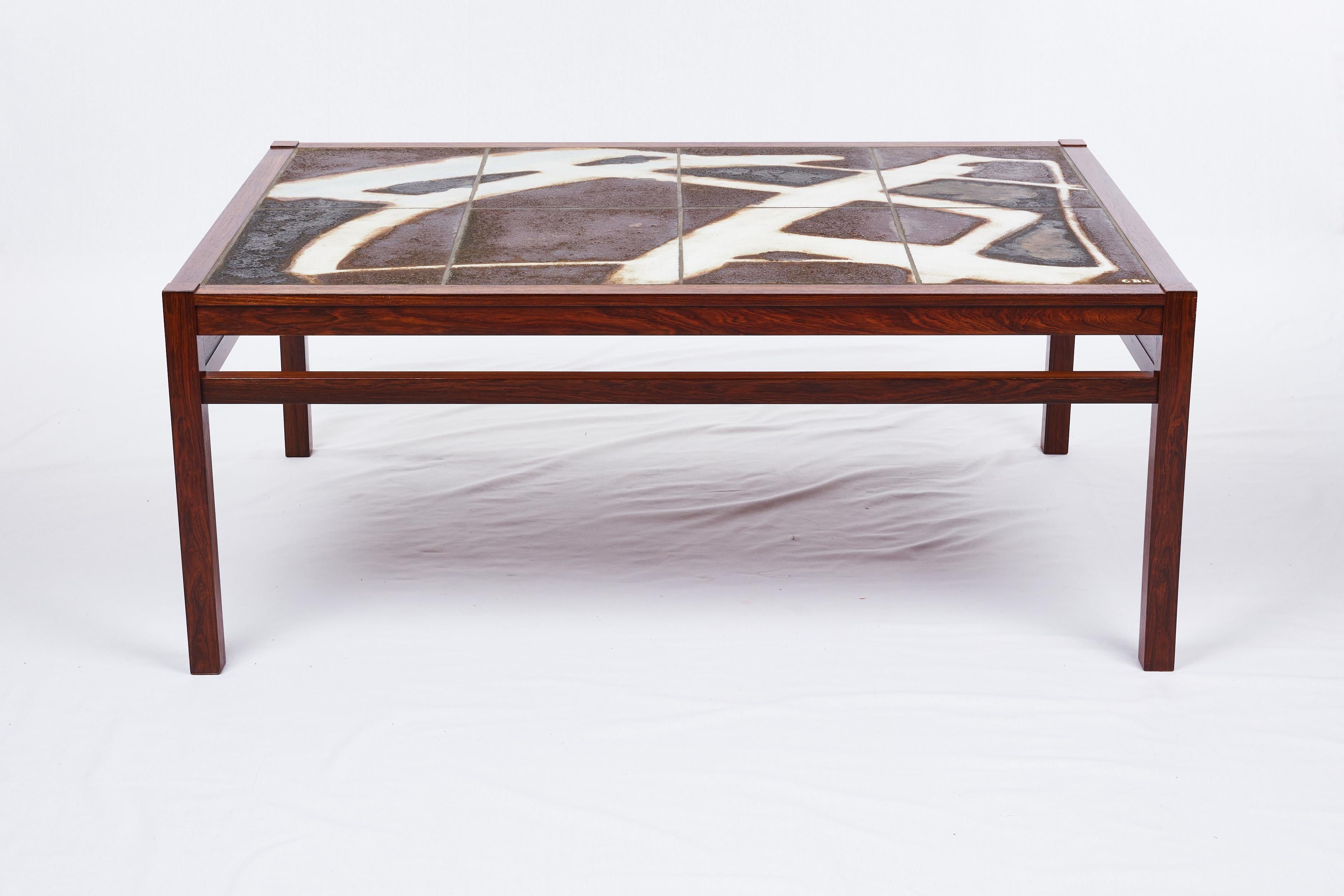 Ole Bjorn Kruger Tile coffee table. Fabulous Abstract Artwork. We can trim the legs if you would like the table lower.