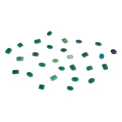 Ole Bjørn Krüger. 28 unique brooches in glazed stoneware in green shades.