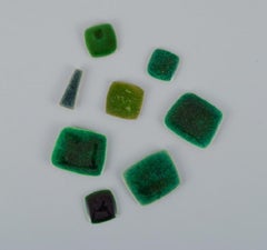 Ole Bjørn Krüger, Eight unique brooches in glazed stoneware in shades of green