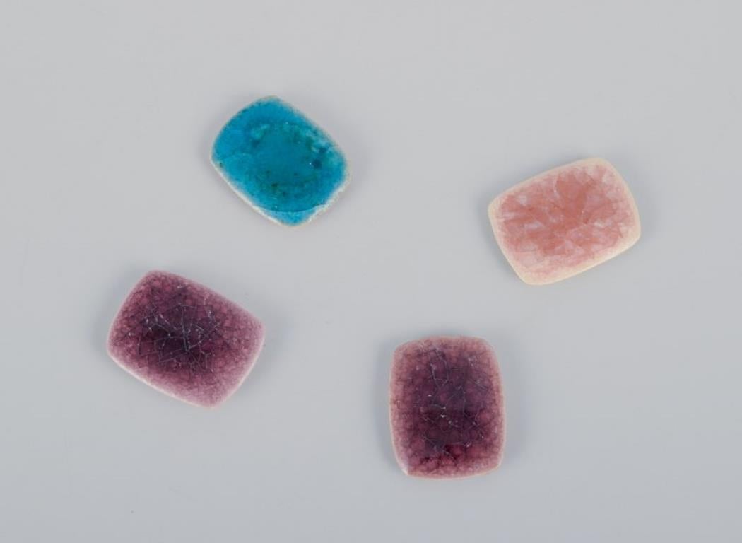 Modern Ole Bjørn Krüger. Eleven unique brooches/ear clips in glazed stoneware For Sale