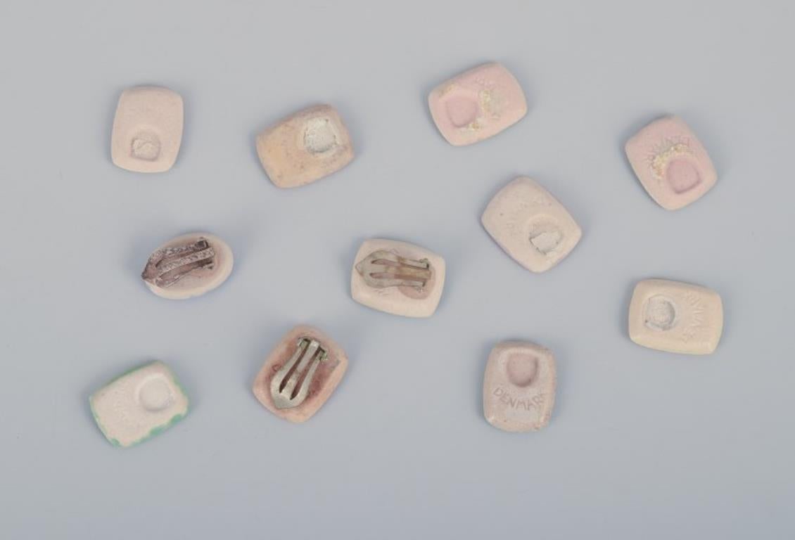 Ole Bjørn Krüger. Eleven unique brooches/ear clips in glazed stoneware For Sale 1