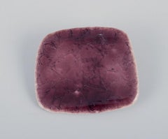 Ole Bjørn Krüger. Five brooches in glazed stoneware in blue and purple shades