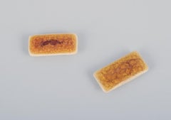 Ole Bjørn Krüger. Seven unique brooches in glazed stoneware.