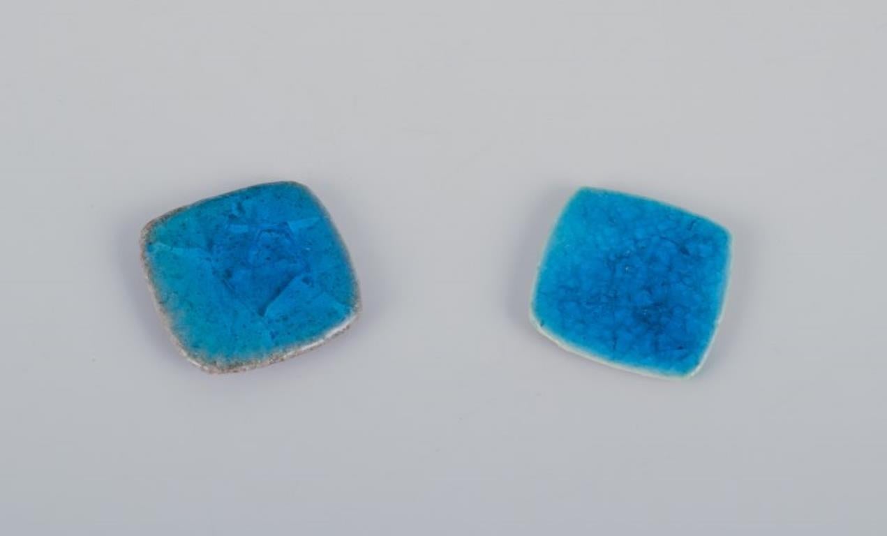 Modern Ole Bjørn Krüger. Six brooches in glazed stoneware in blue and white shades For Sale