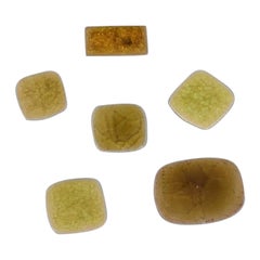 Ole Bjørn Krüger. Six brooches in glazed stoneware in shades of yellow and brown