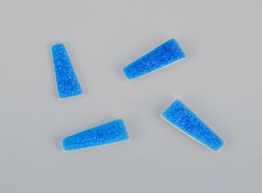 Ole Bjørn Krüger. Ten unique brooches in glazed stoneware in blue shades. In Excellent Condition For Sale In bronshoj, DK