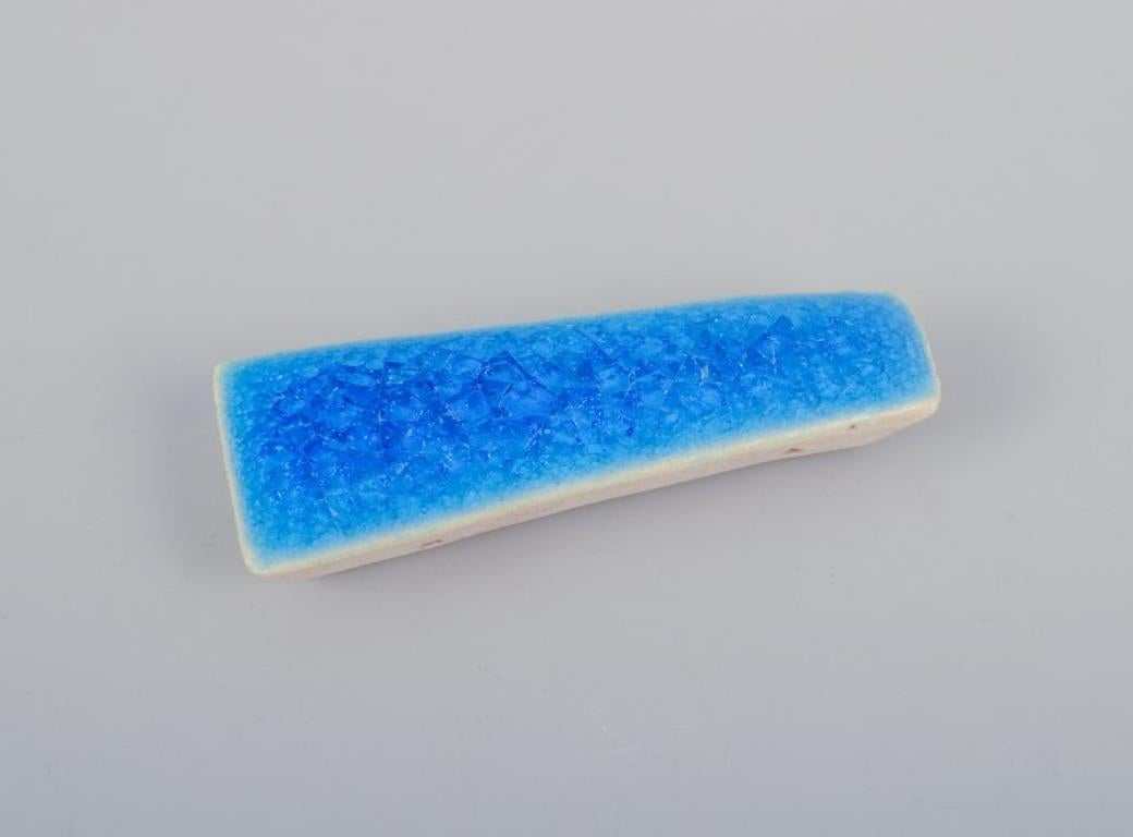 Ole Bjørn Krüger. Ten unique brooches in glazed stoneware in blue shades. For Sale 1