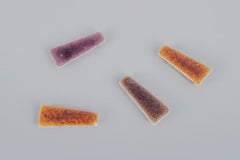 Ole Bjørn Krüger. Ten unique brooches in glazed stoneware in various colors.