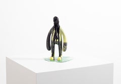 «Everything is liquid» resin sculpture of a man covered in pitch black liquid