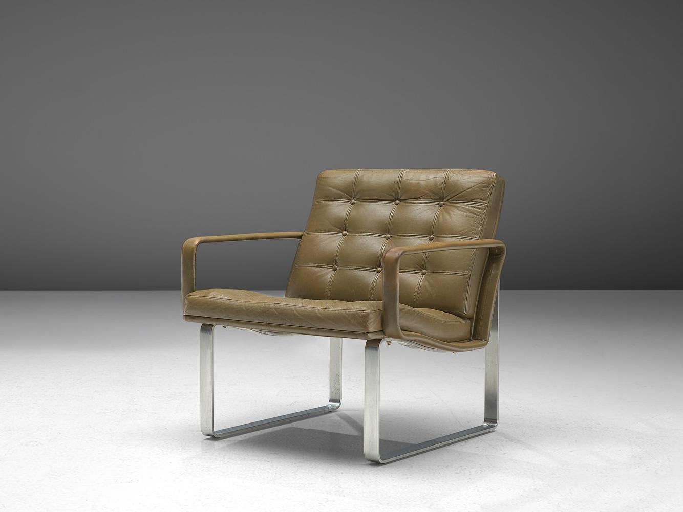 Ole Gjerløv-Knudsen & Torben Lind for France & Søn, armchair, chrome-plated metal and leather, Denmark, 1962 

This lounge chair is designed by Ole Gjerløv-Knudsen & Torben Lind as part of the Moduline series established in 1961. Remarkable about