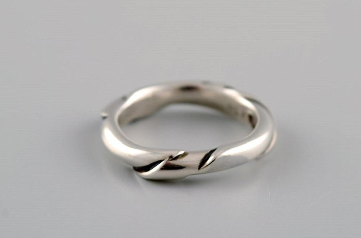 Ole Kortzau for Georg Jensen. Ring in sterling silver. Model 238. Late 20th Century.
Width: 5 mm.
Diameter: 18 mm.
US size: 7.75.
In excellent condition.
Stamped.
In most cases, we can change the size for a fee (50 USD) per ring.