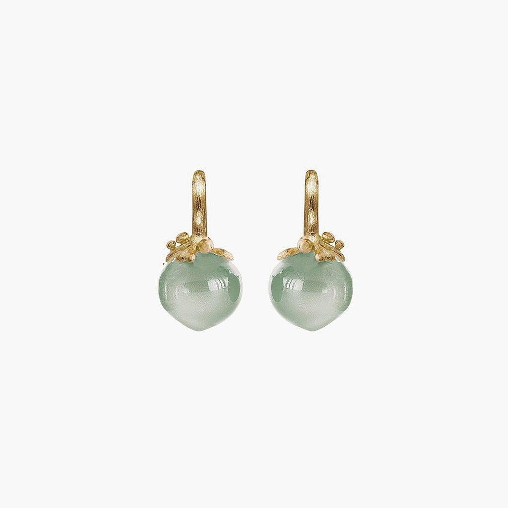 Exuding an inexplicable magical quality, Ole Lynggaard Copenhagen creates soft, organic designs inspiring women to express their enchanting, feminine side.

These earrings feature aquamarine cabochons set in 18K yellow gold

Details
Aquamarine
18K