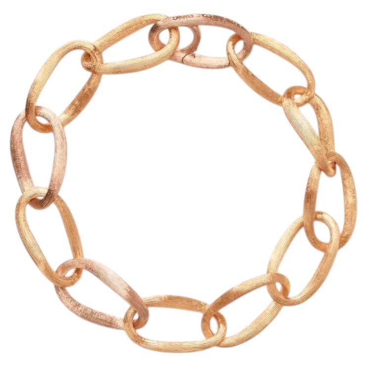 Pulsera «Love» de Ole Lynggaard en oro amarillo y rosa de 18 quilates