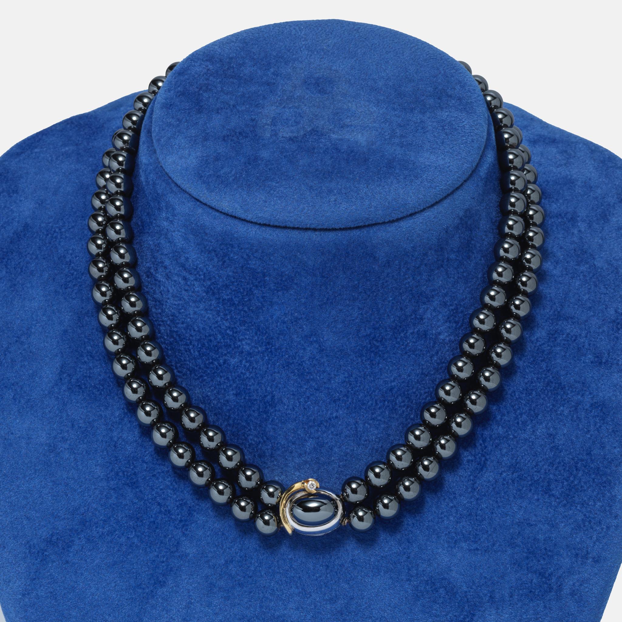 Women's or Men's Ole Lynggaard necklace with hematite beads. Lock made of gold with a diamond. For Sale