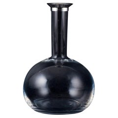 Ole Palsby for Georg Jensen, wine decanter in clear glass and sterling silver.