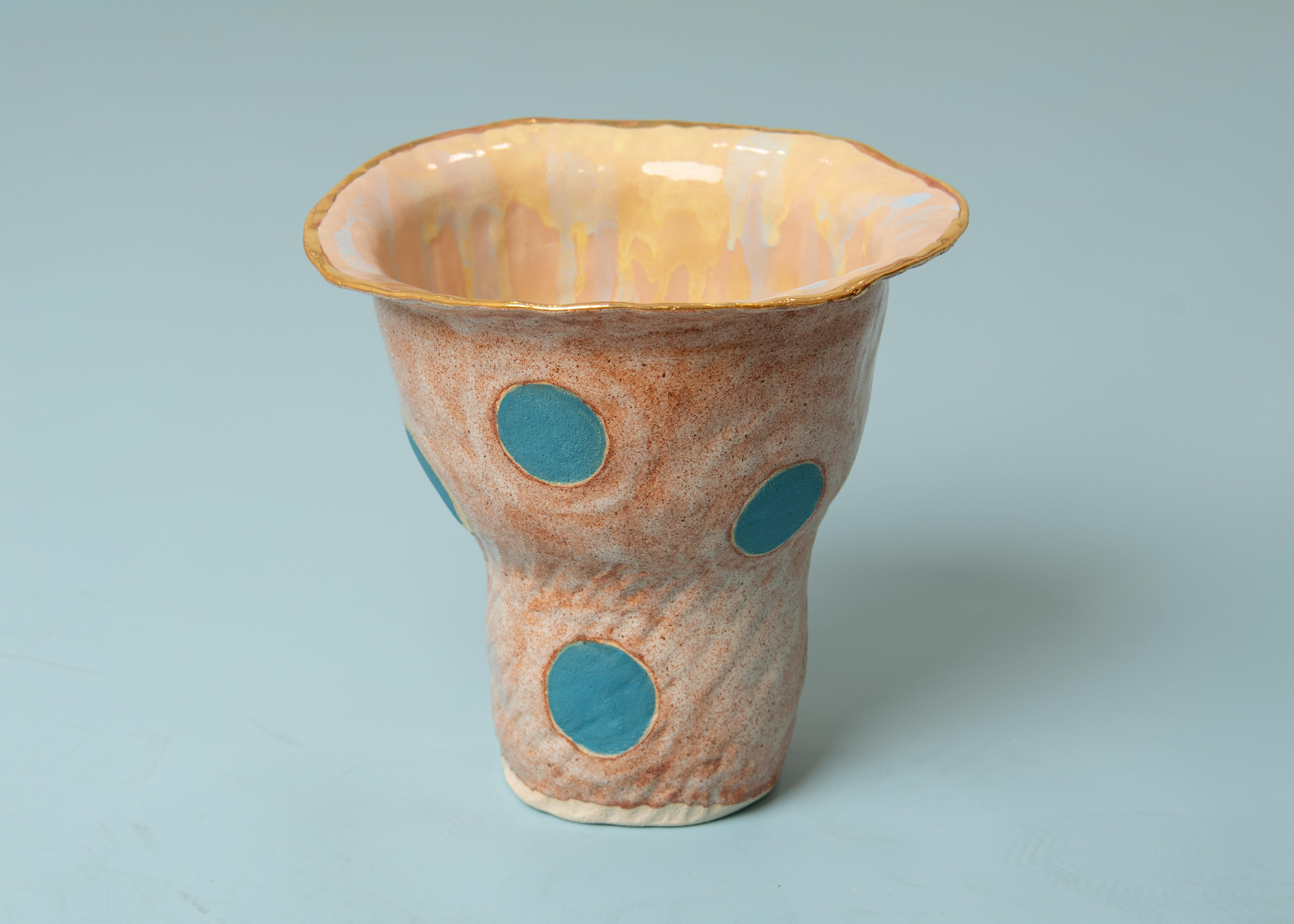 Numbered Olé Vase in the collection Olé, a tribute to the Flamenco culture.
Built and glazed by hand, this is a unique piece. 
Materials: Ceramics stoneware, glaze, gold lustre.
Color: Beige with brown particles, Blue tuquoise dots
The Olé vase