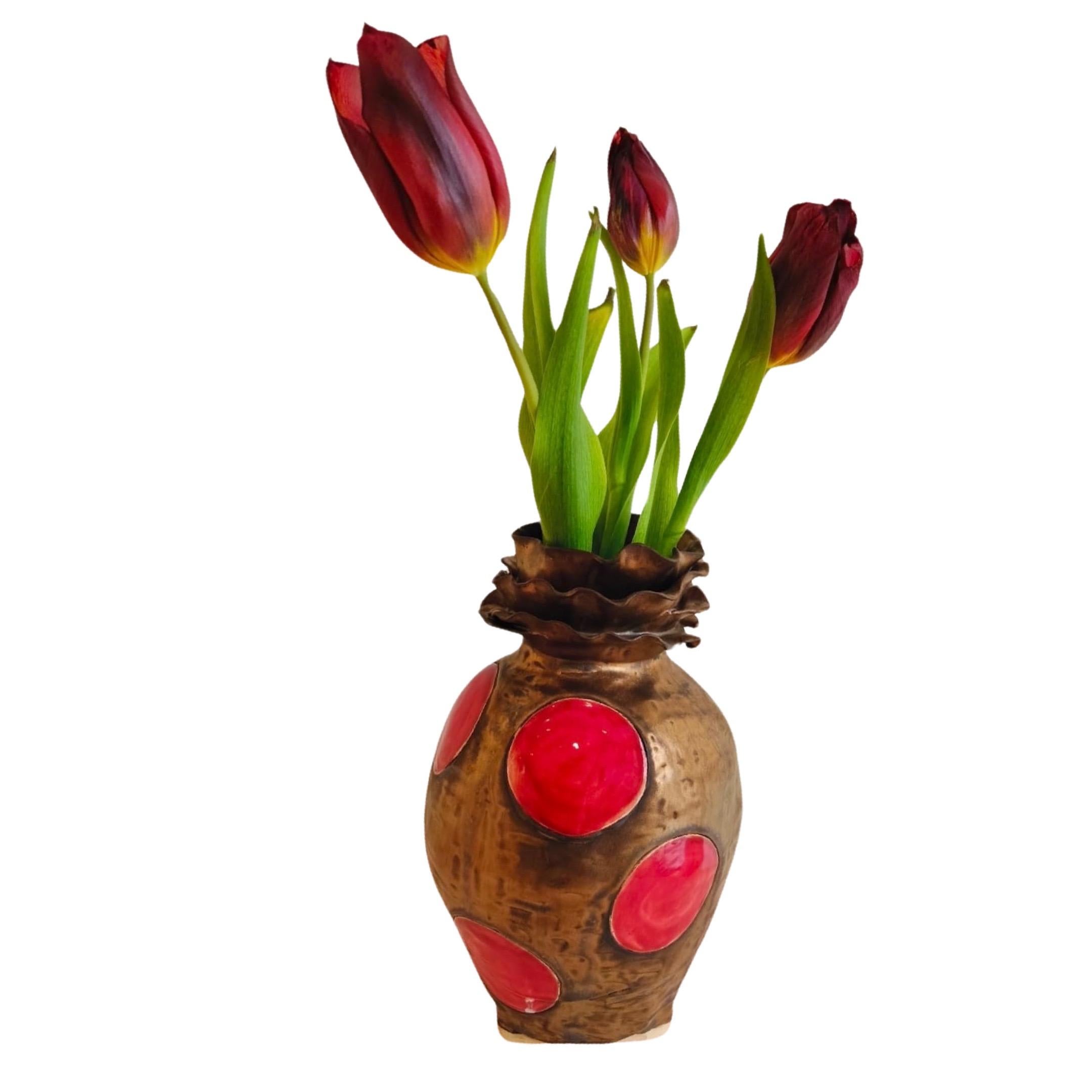 The Olé collection is a tribute to Spain, as colourful and enchanting as it is. Each vase is a celebration of joy. 
Unique piece in stoneware, hand built and hand glazed and lustred in Gold by artist - designer Hania Jneid 
The Olé collection is an
