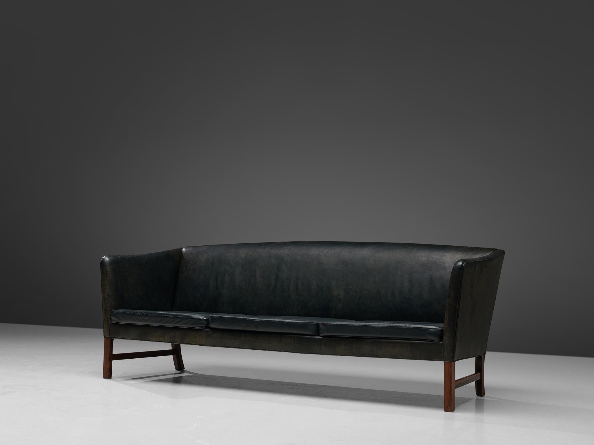 Ole Wanscher for P. Jeppesen, three-seat '603' sofa for reupholstery, leather and rosewood, Denmark, 1960s.

A Classic design redolent of both English and oriental furniture-art designed by Ole Wanscher. It has a Minimalist, timeless appearance