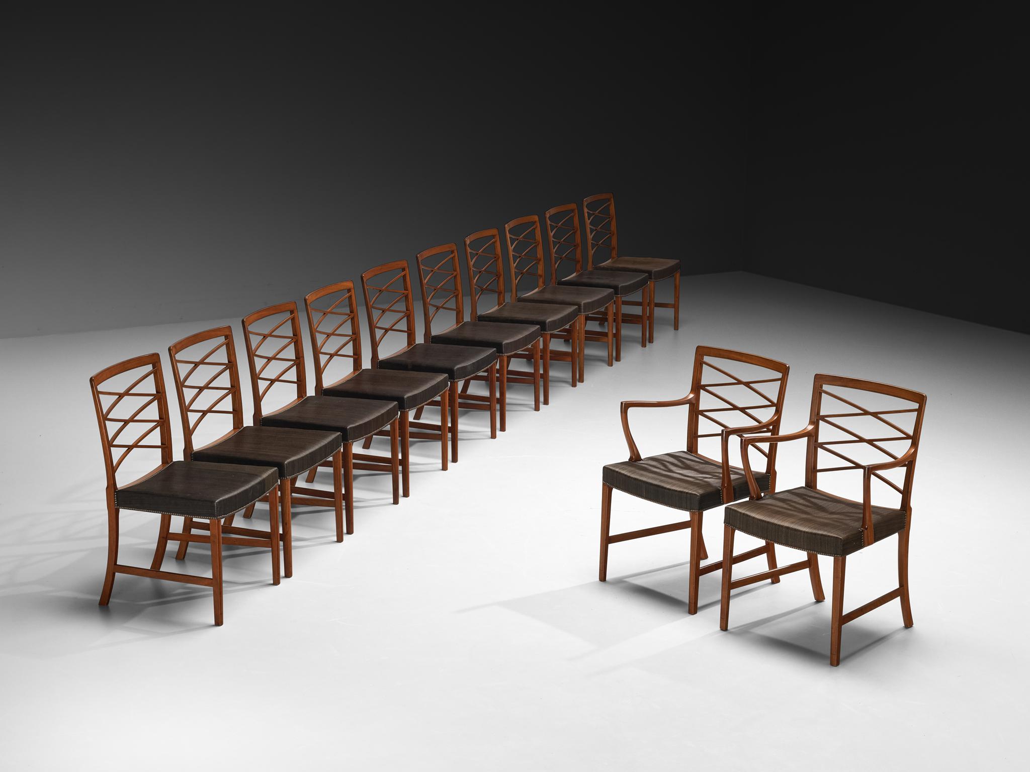 Ole Wanscher and A.J. Iversen, set of chairs, mahogany, fabric, Denmark, 1940s

This elegant set of dining chairs, including both side chairs and armchairs, was designed by Ole Wanscher and crafted by master cabinetmaker A.J. Iversen in Denmark