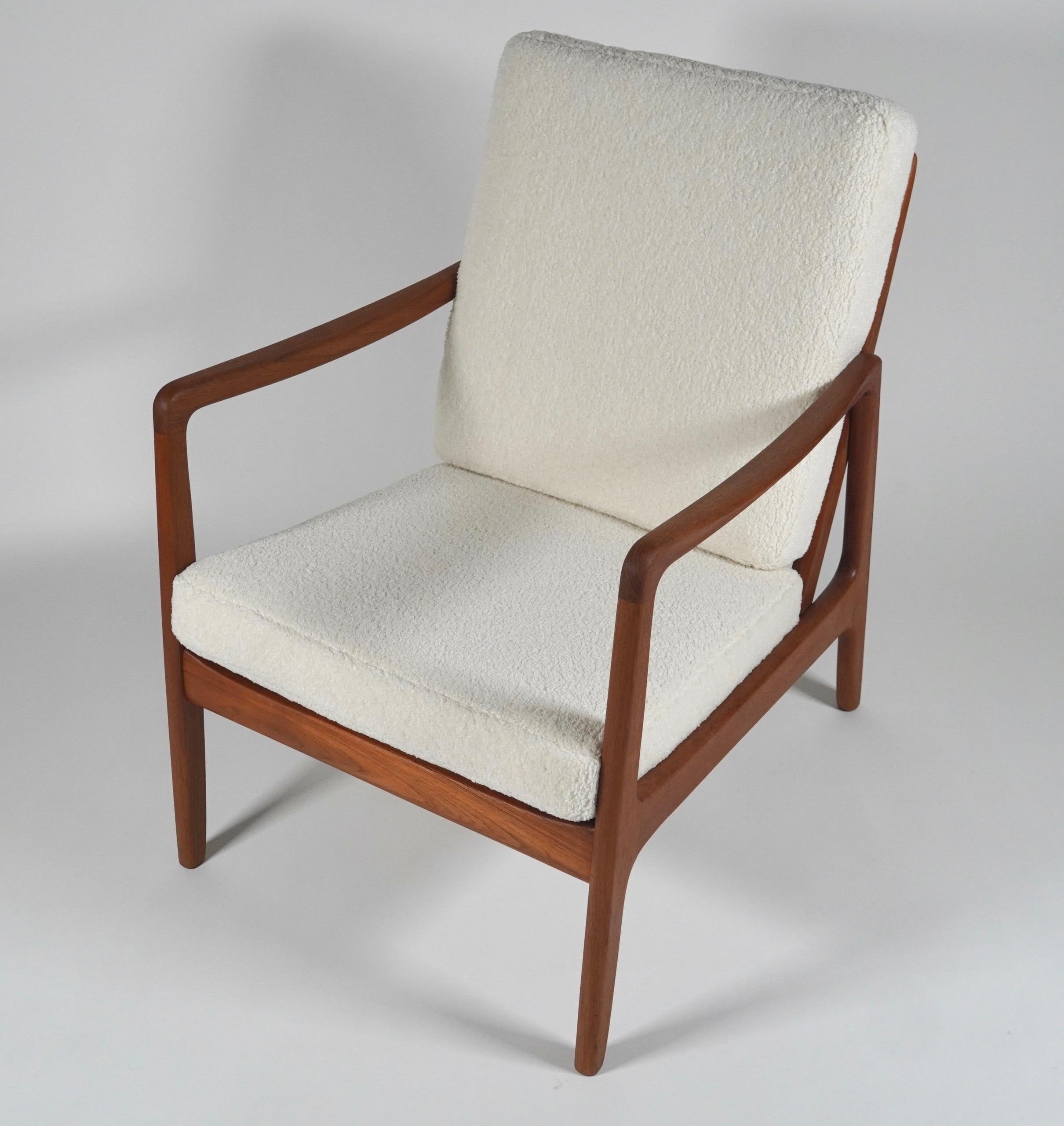Armchair Model 166 designed by Danish architect Ole Wanscher crafted by France & Deverkosen of Denmark and imported by John Stuart Inc., circa 1950s N.Y. John Stuart was a collector of important modern art who had a business importing high end