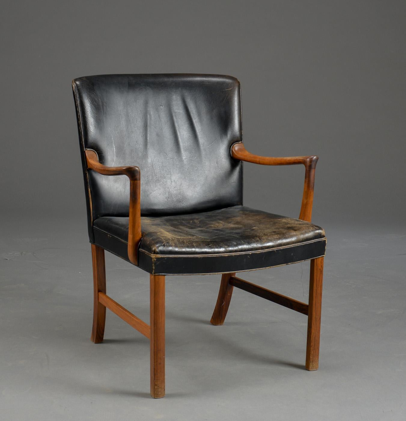 Ole Wanscher armchair model J 3063 by Cabinetmaker A. J. Iversen in Denmark

Leather showing crackling and substantial wear.

Additional cost to reupholster is £1800.