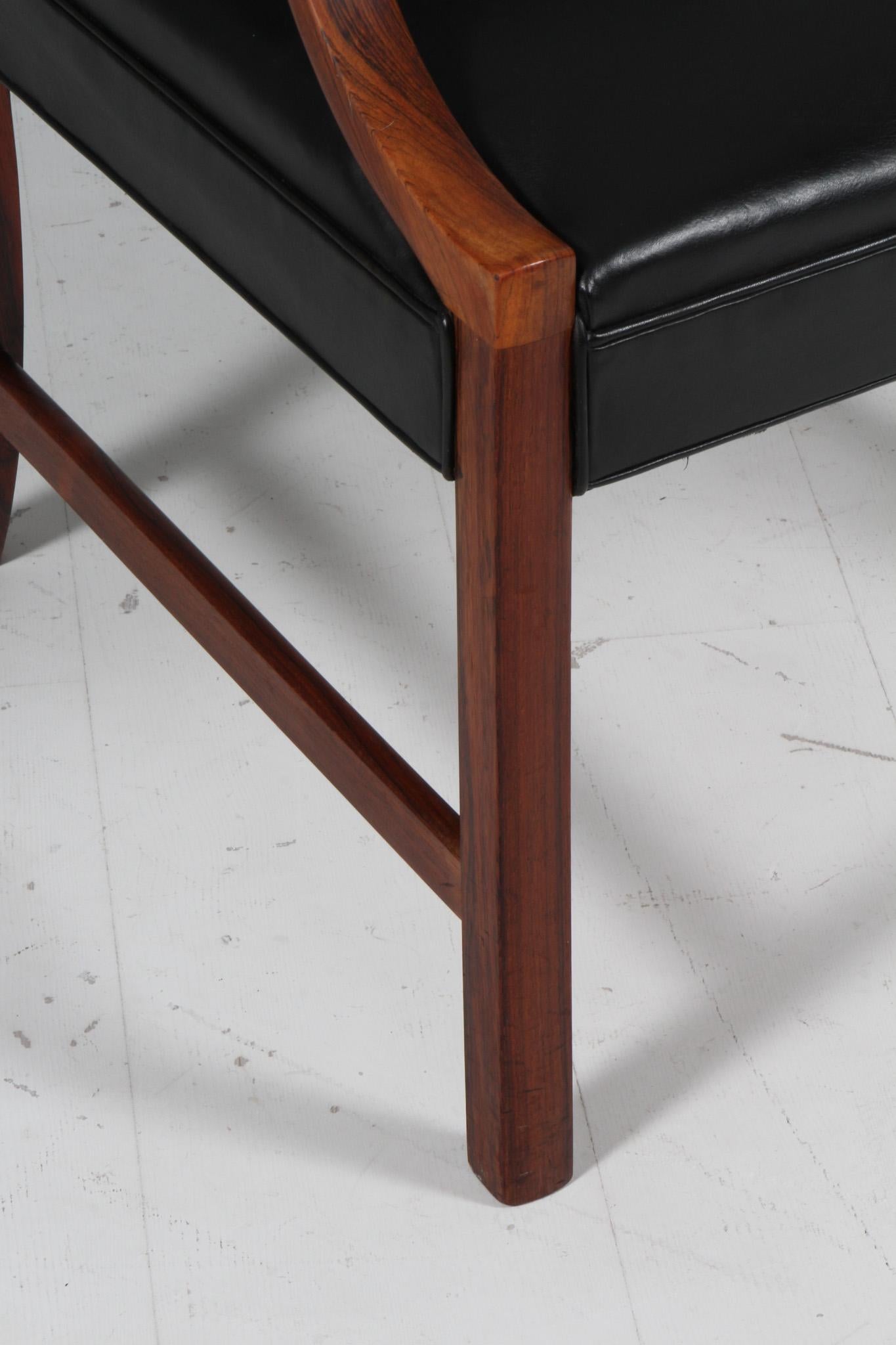 Danish Ole Wanscher armchair of black leather, Denmark 1950s For Sale