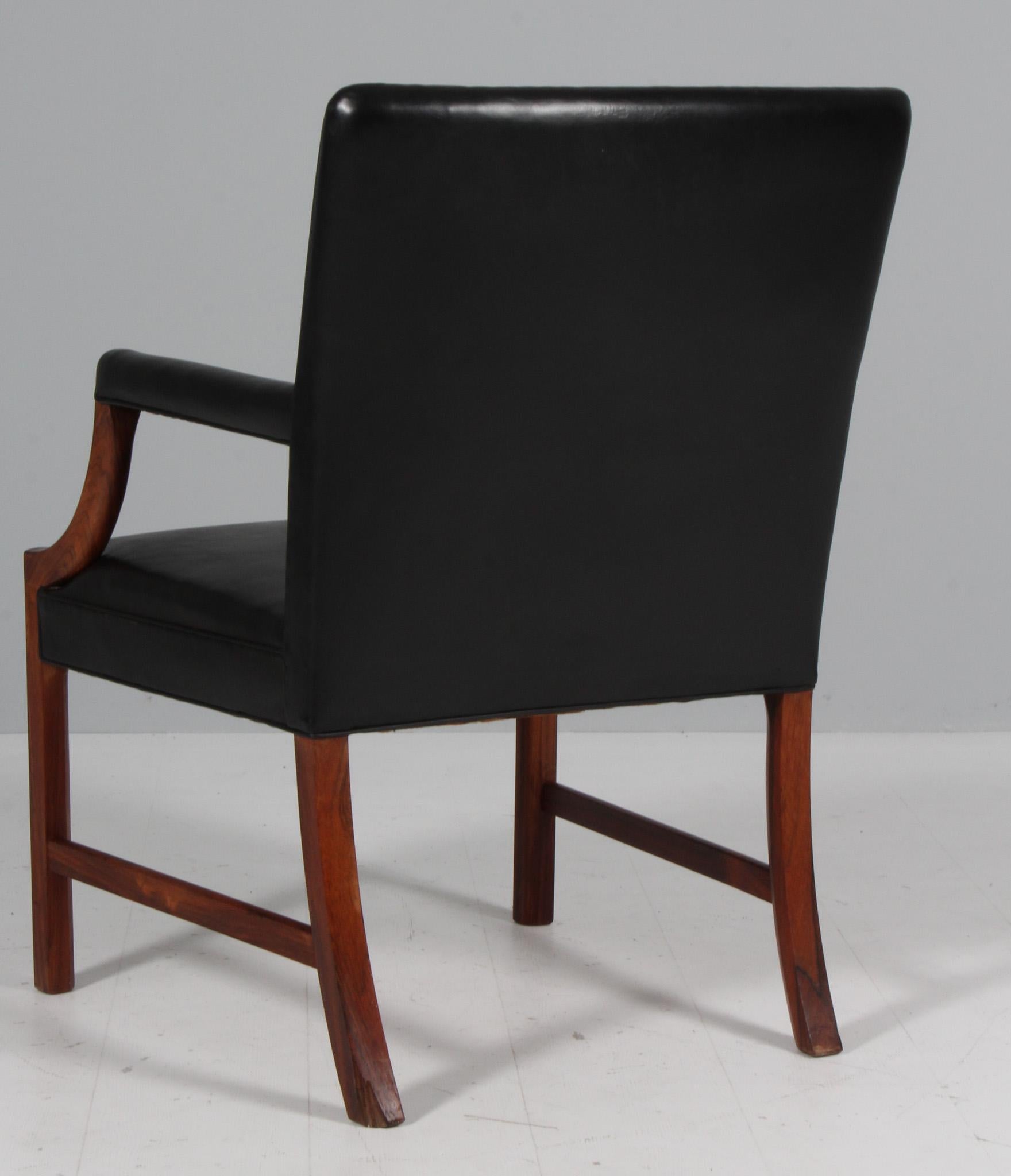 Leather Ole Wanscher armchair of black leather, Denmark 1950s For Sale