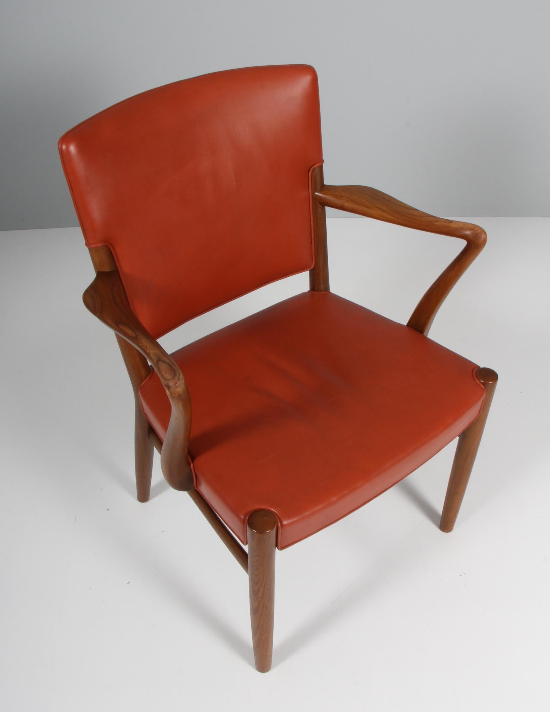 Ole Wanscher, attributed. armchair with frame of nutwood.

Original upholstered with brown patinated leather.

Attributed to Fritz Hansen.