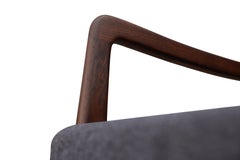 Sedia a dondolo danese in palissandro brasiliano di Ole Wanscher