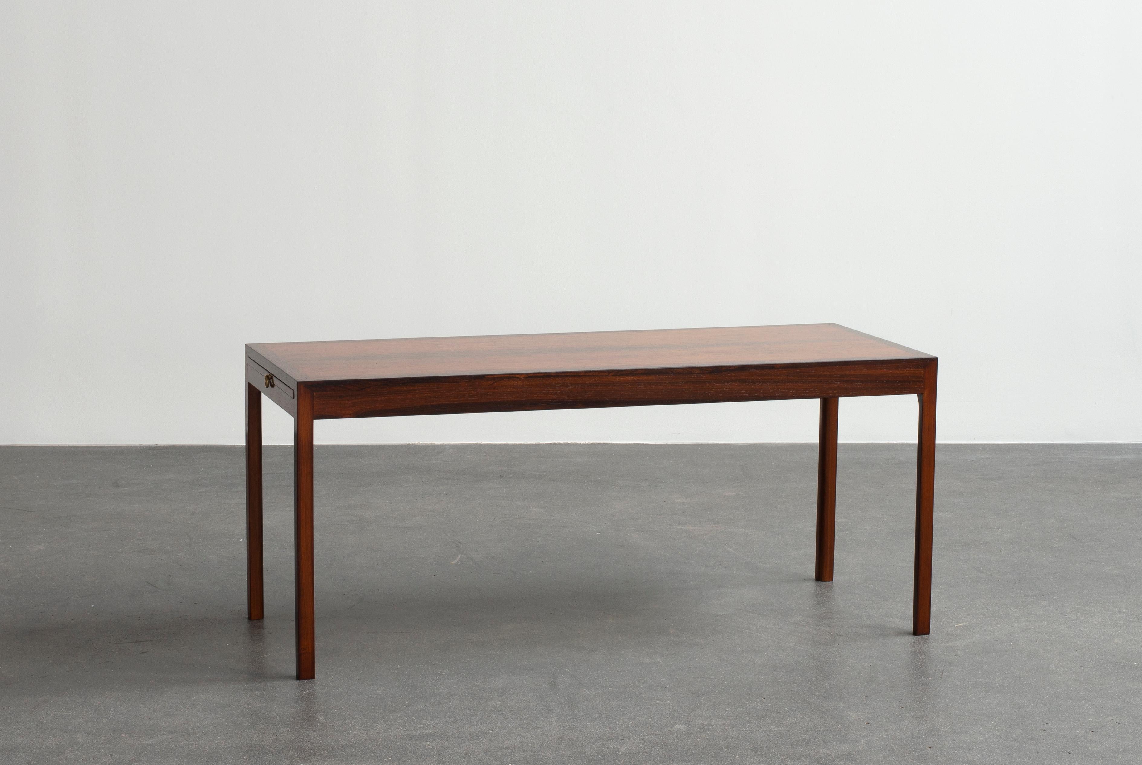 Ole Wanscher coffee table in rosewood.  Executed by cabinetmaker A.J. Iversen, Copenhagen, Denmark.