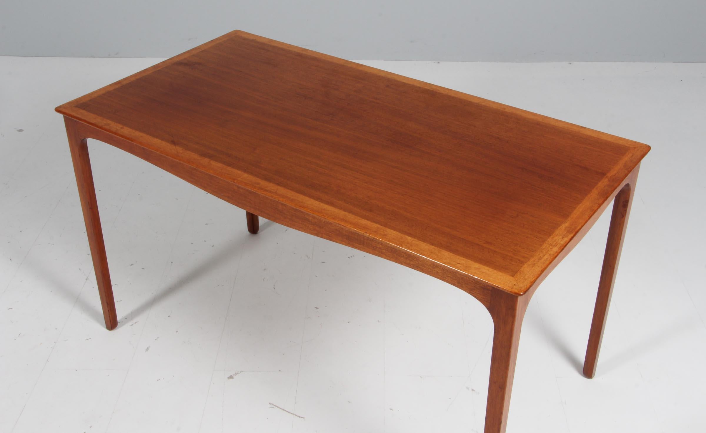 Ole Wanscher coffee table of mahogany.

Made by A. J. Iversen.

  