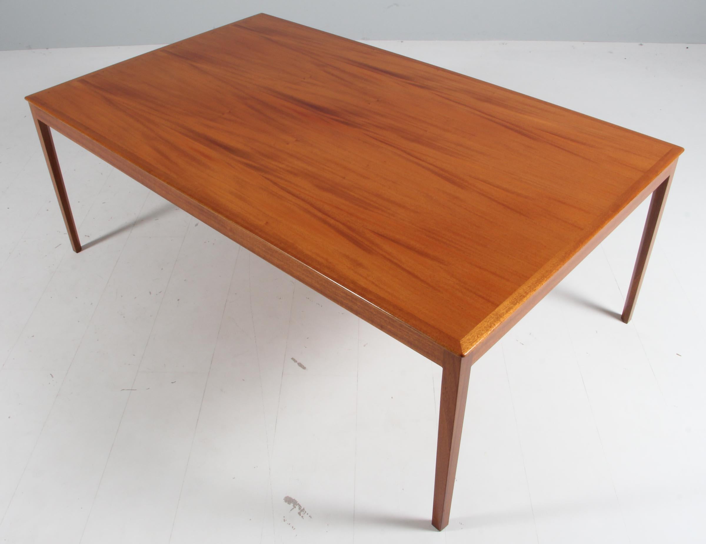 Ole Wanscher coffee table of mahogany.

Made by A. J. Iversen.

  