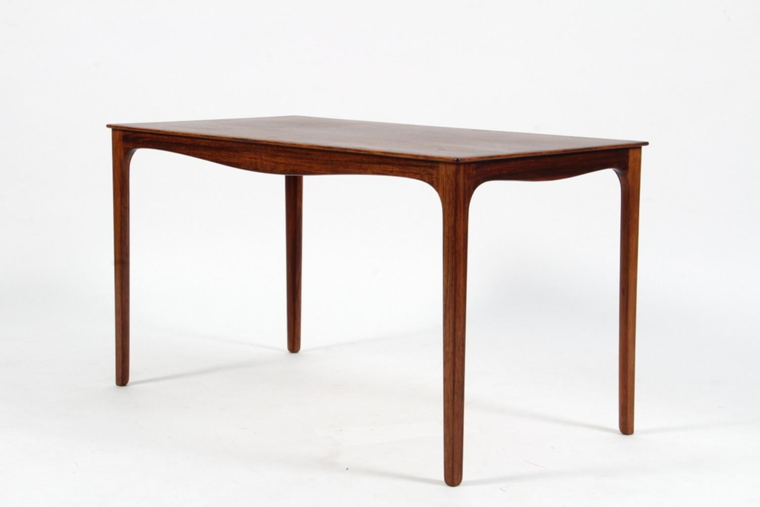 Ole Wanscher coffee table of rosewood.

Made by A. J. Iversen.

