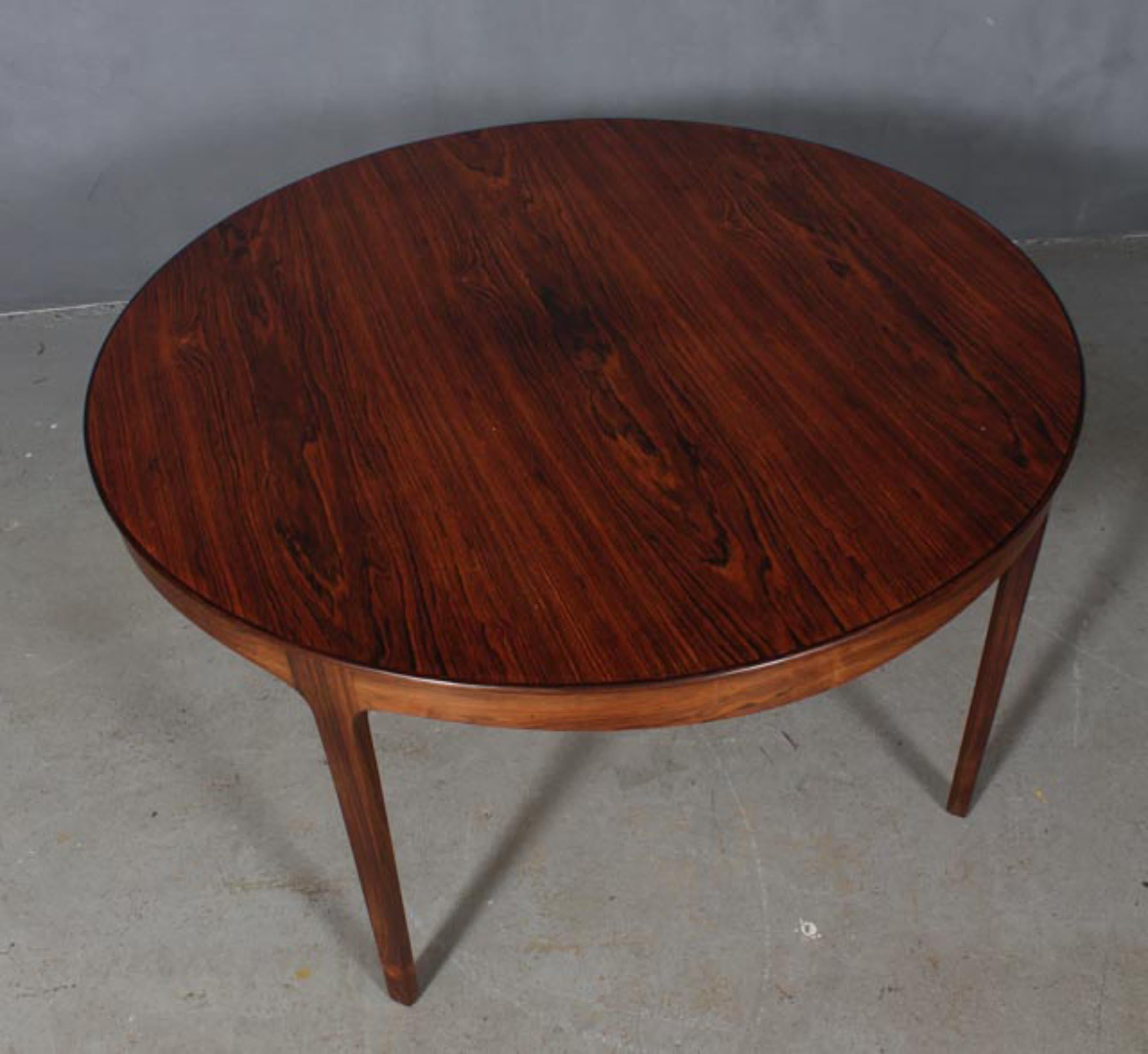 Ole Wanscher coffee table of rosewood.

Made by A. J. Iversen.

