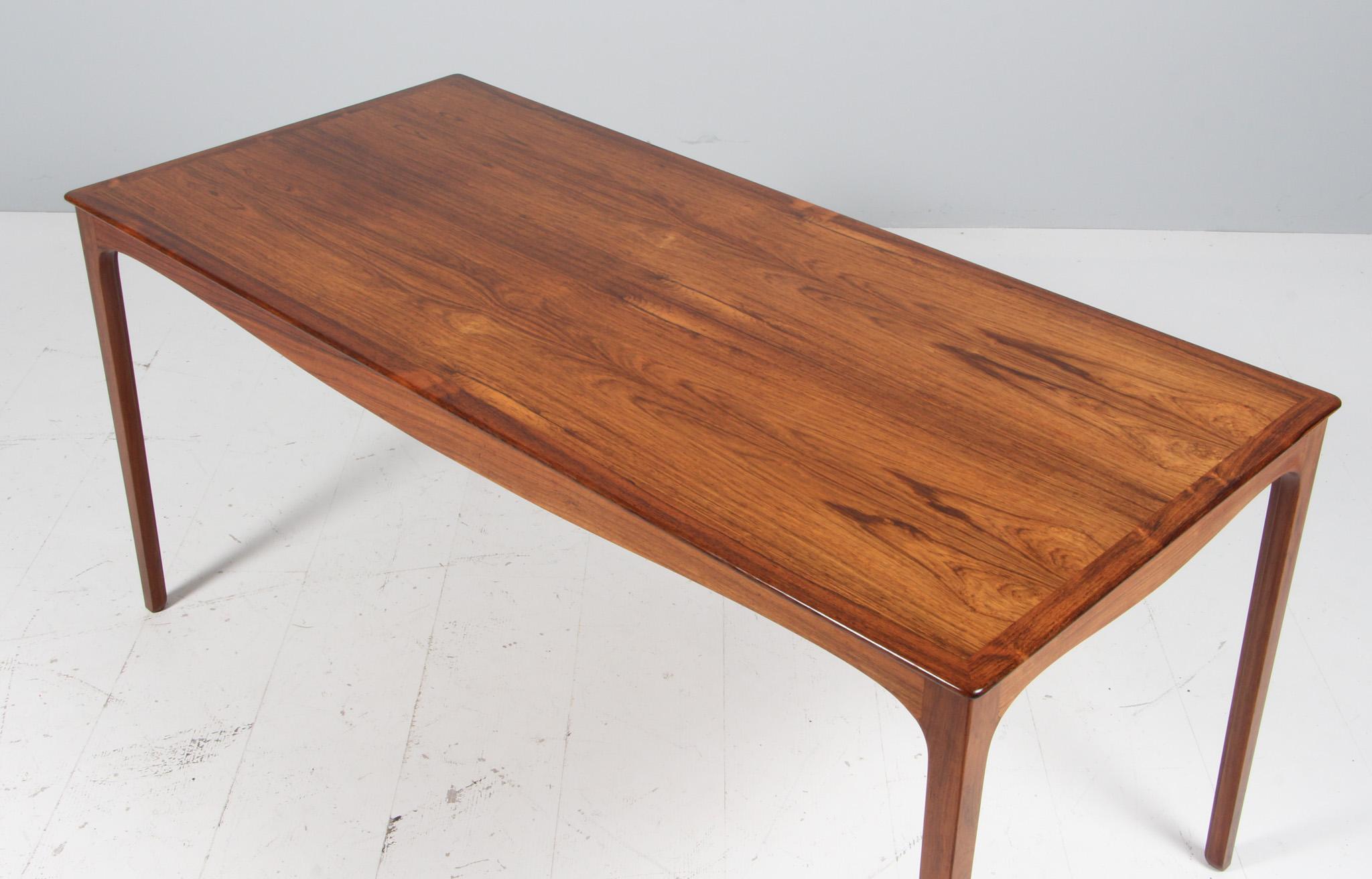 Ole Wanscher coffee table of rosewood.

Made by A. J. Iversen.

  