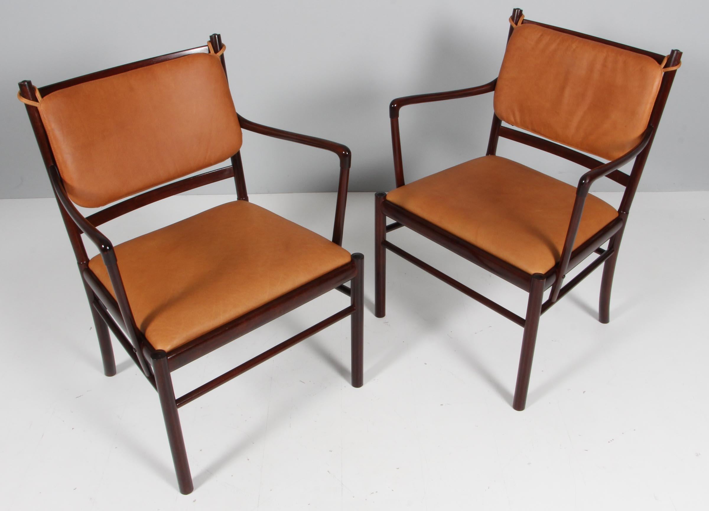 Ole Wanscher armchairs new upholstered with Vintage aniline leather.

Made in mahogany.

Model PJ 301 colonial armchair, made by Poul Jeppesen.