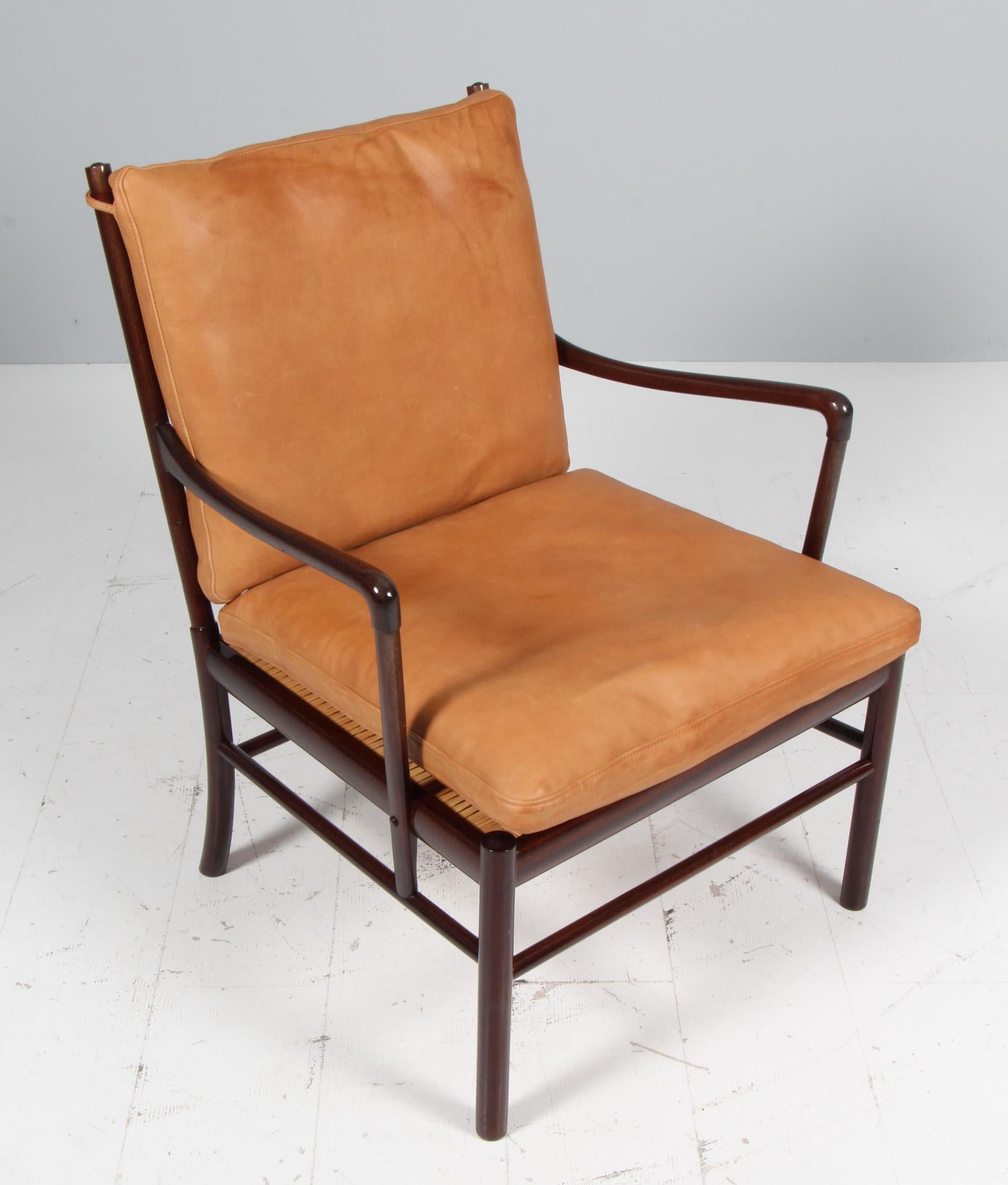 Sedia lounge Ole Wanscher nuova, rivestita in pelle anilina vintage color cognac.

Realizzato in mogano. 

Sedia coloniale modello PJ 149, realizzata da Poul Jeppesen.