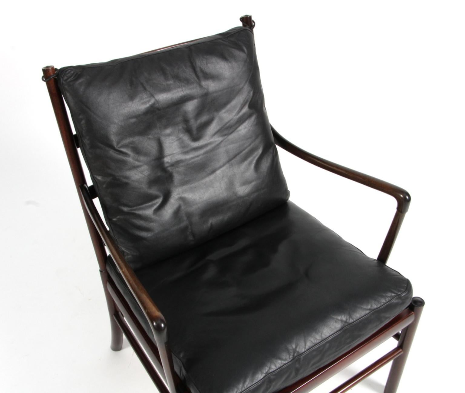 Ole Wanscher lounge chair original upholstered with black leather.

Made in mahogany. 

Model PJ 149 colonial chair, made by Poul Jeppesen.