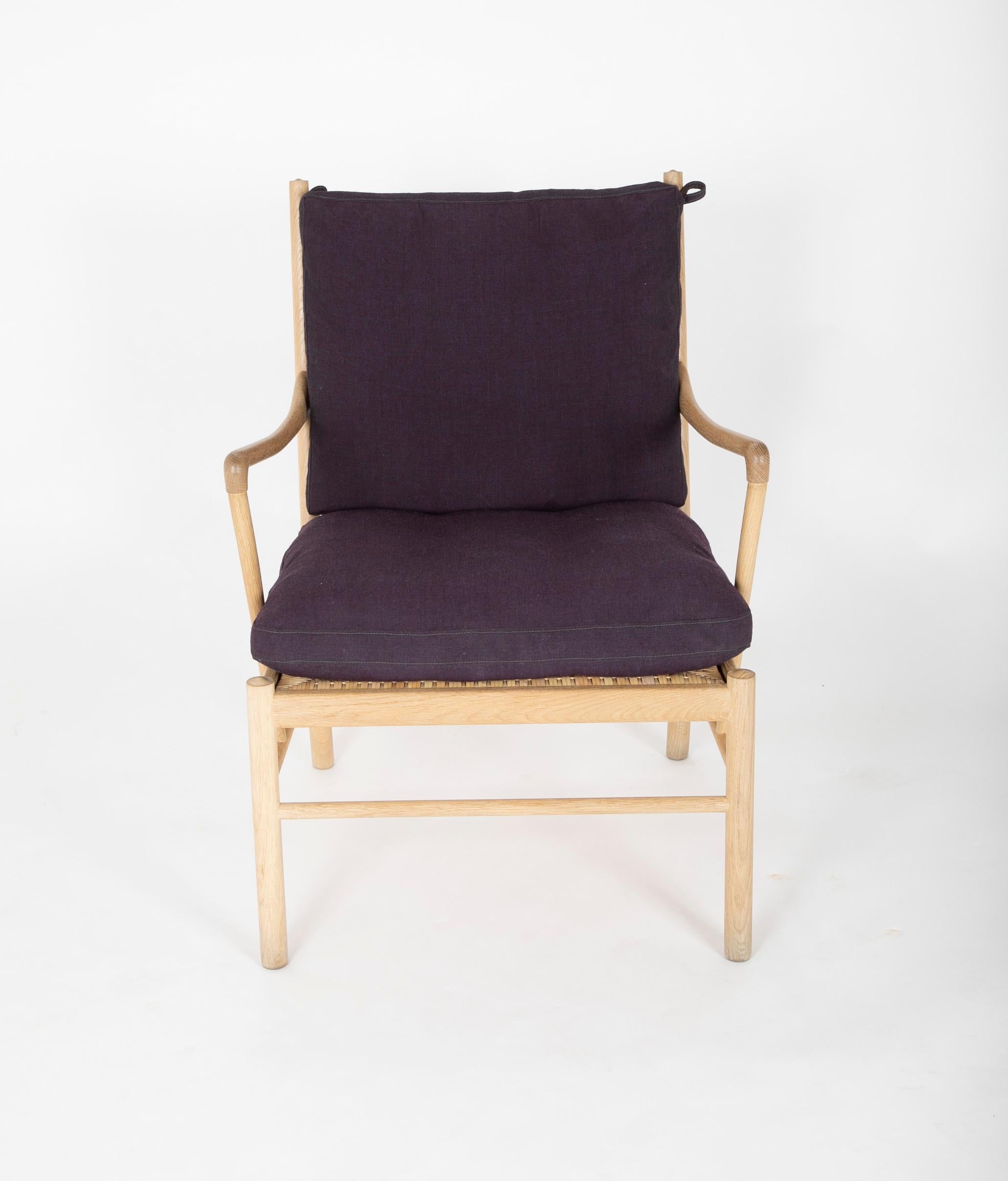 Ole Wanscher 'Colonial Chair' (OW 149) for Carl Hansen & Sons. Chair frame is oak with drop in caned frame seat and purple canvas cushions.