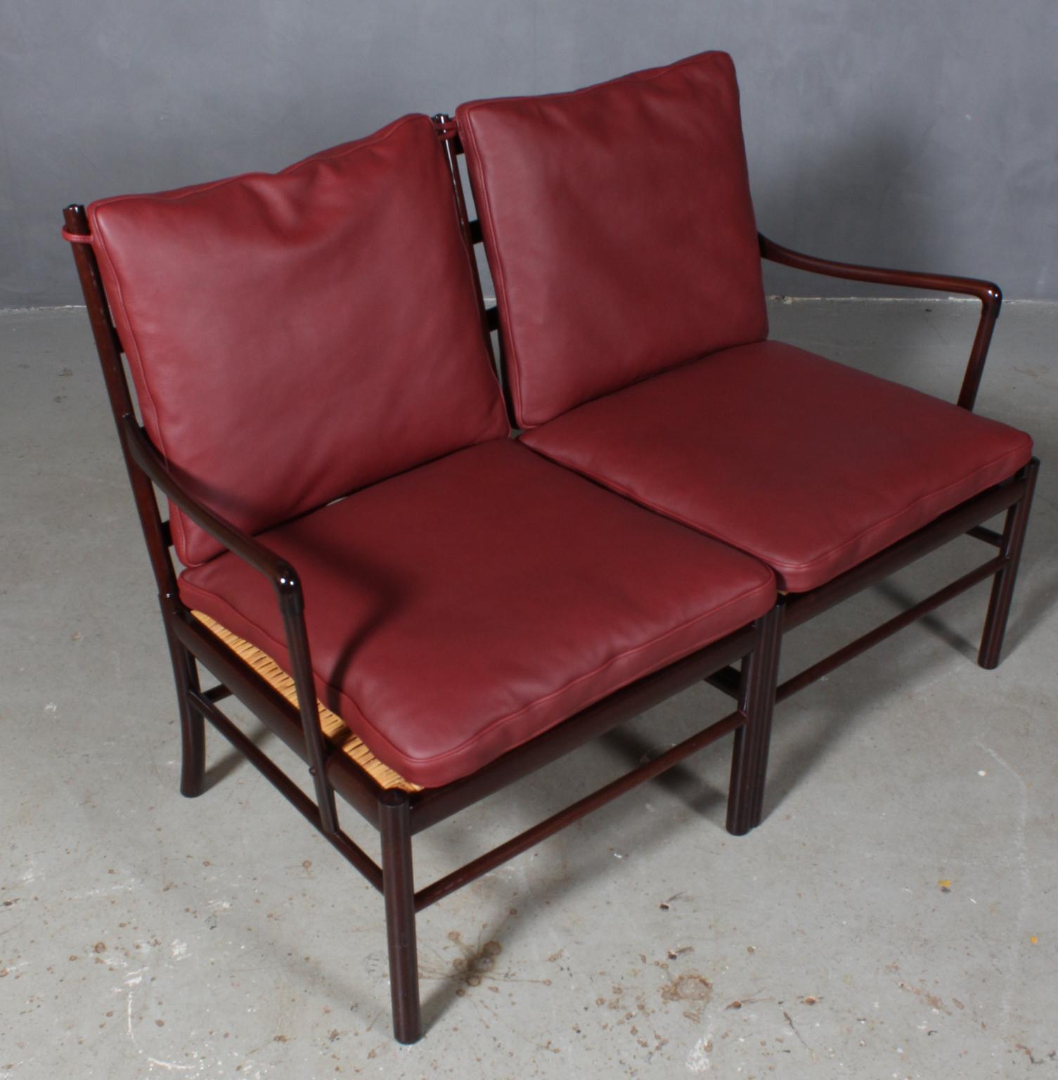 Ole Wanscher colonial sofa new upholstered with Indian red elegance aniline leather.

Made in mahogany. 

Model PJ 149 colonial chair, made by Poul Jeppesen.