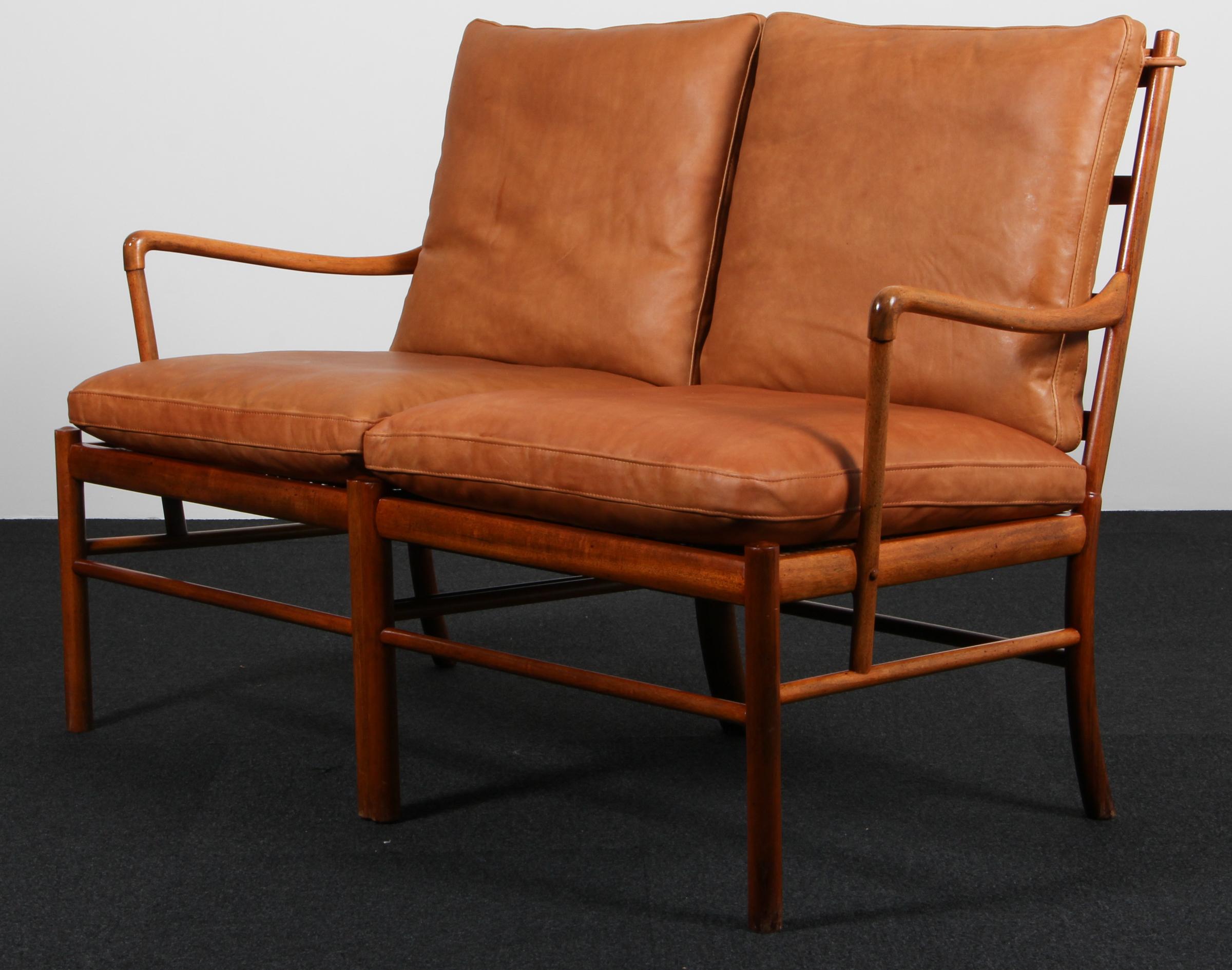 Ole Wanscher two seat sofa new upholstered with cognac vintage aniline leather.

Made in mahogany. 

Model PJ 149 colonial chair, made by Poul Jeppesen.