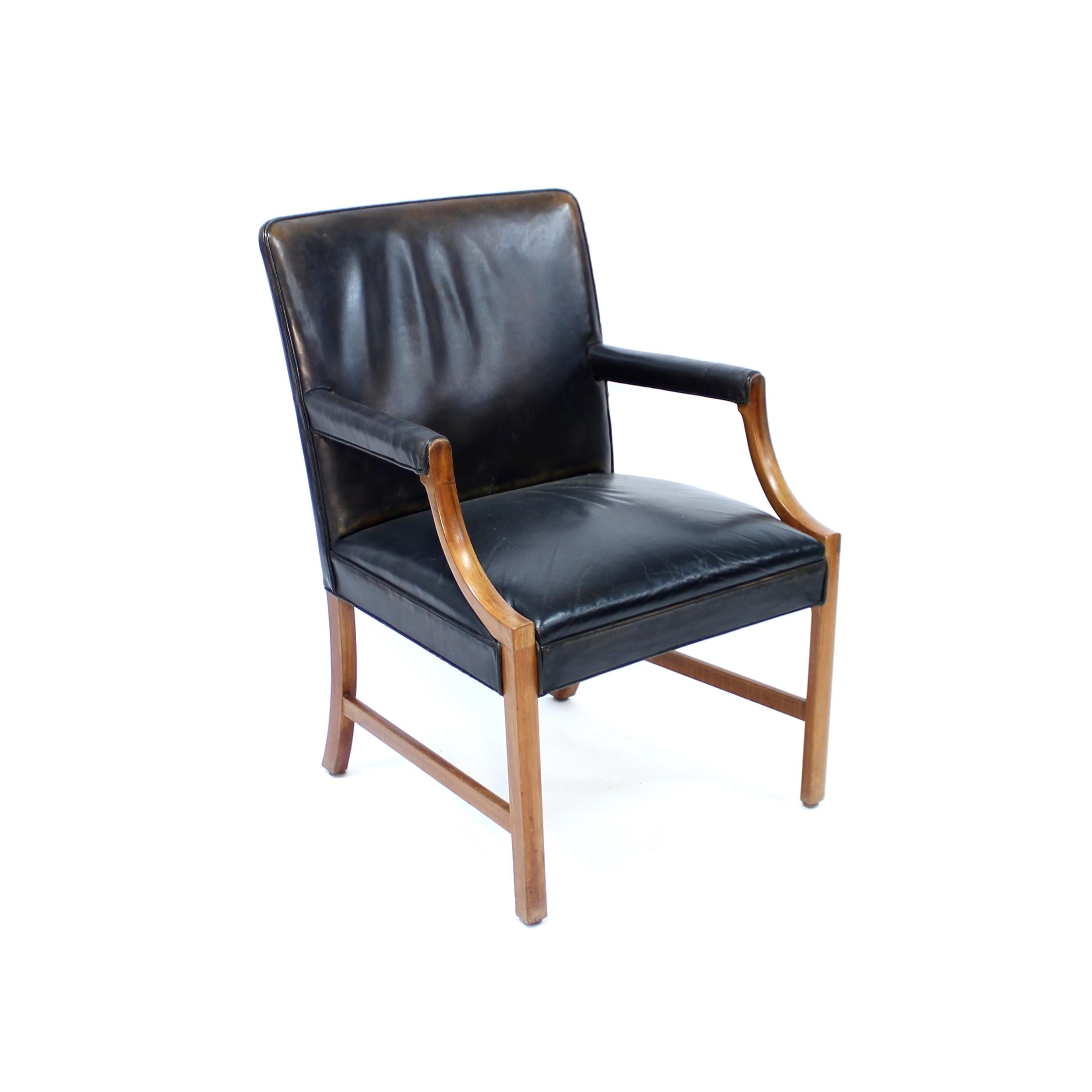 20th Century Ole Wanscher, Danish leather and Mahogany lounge chair for A.J. Iversen, 1940s For Sale