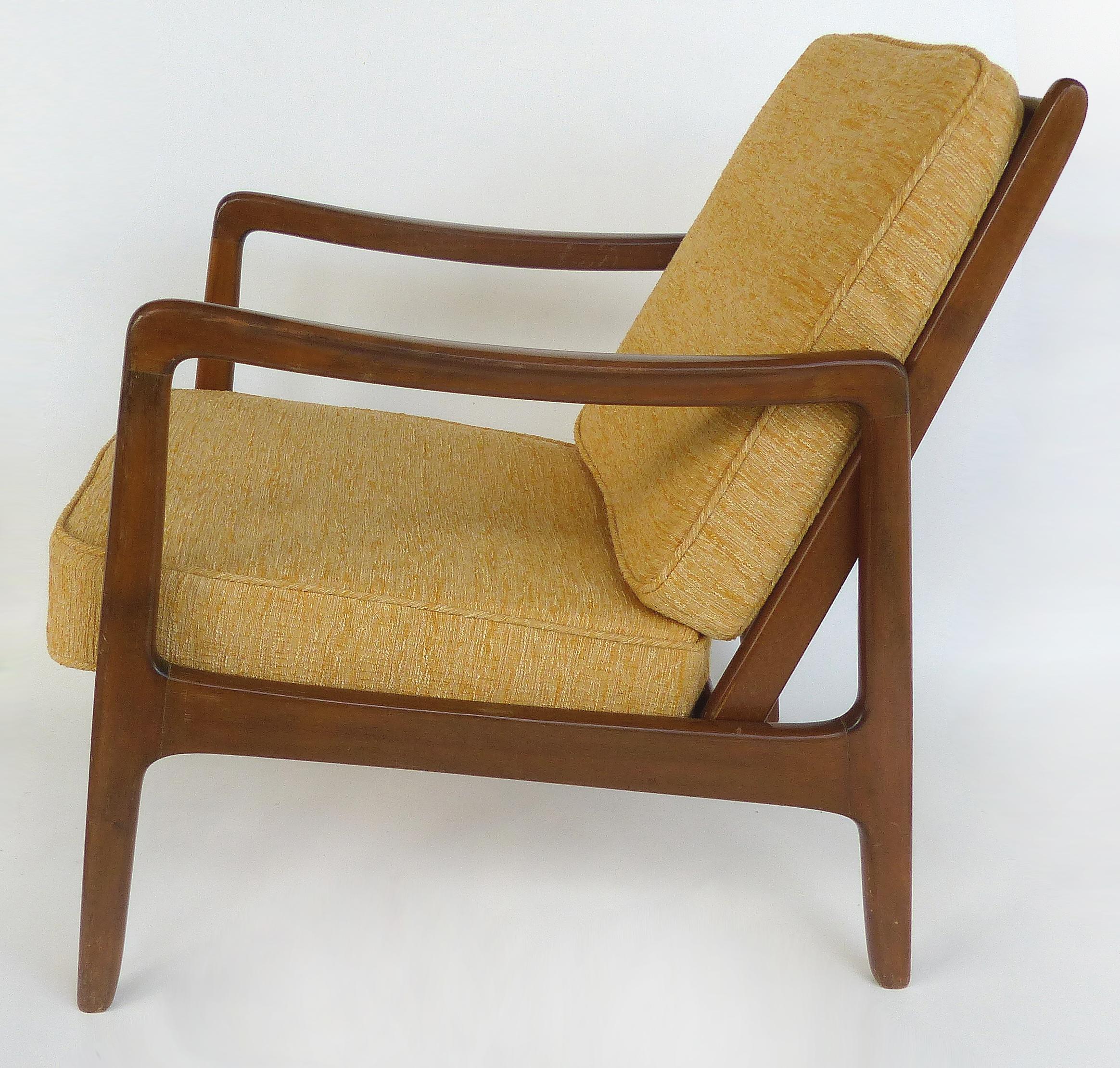 Ole Wanscher Danish Modern Armchair for John Stuart

Offered for sale is a midcentury Danish modern teak armchair designed by Ole Wanscher for John Stuart. The chair has what appears to be the original seat and back cushions and is marked on the